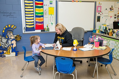 Teacher Talking To Student
